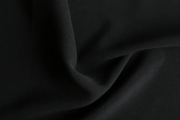 istock Texture of beautiful black fabric as background, closeup 1340890419
