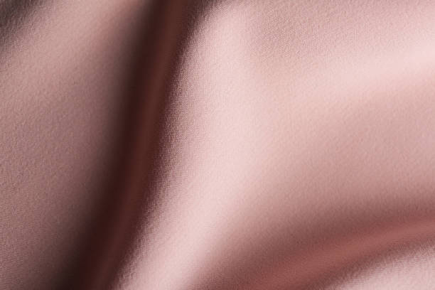 istock Texture of beautiful pink fabric as background, closeup 1340890746