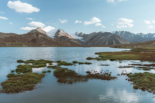 Scenic view  of lake in   Tien Shan mountains in Kyrgyzstan in summer
