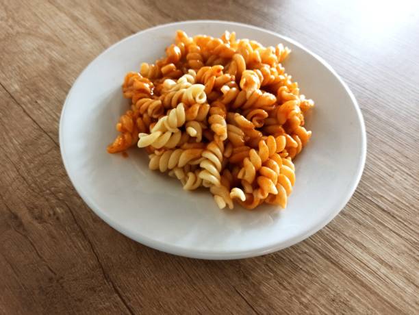 istock Fusilli macaroni pasta with tomato sauce serving in Istanbul turkey 1340893436