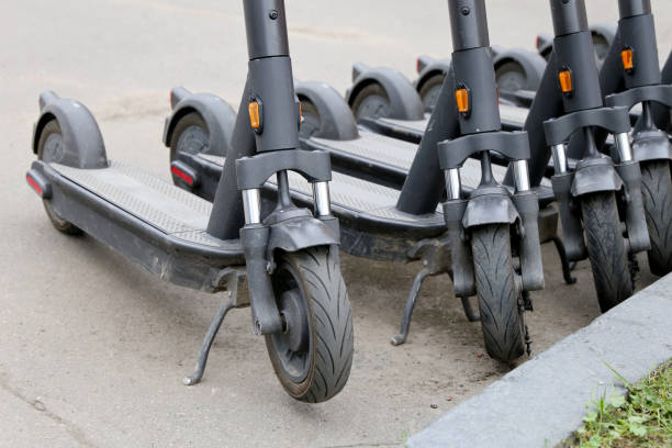 istock Electric scooters in a row on the parking lot 1340894487