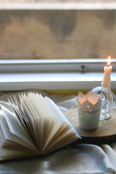 istock Cookies, Book and Candles 1340896842
