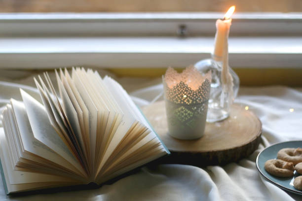istock Cookies, Book and Candles 1340896845