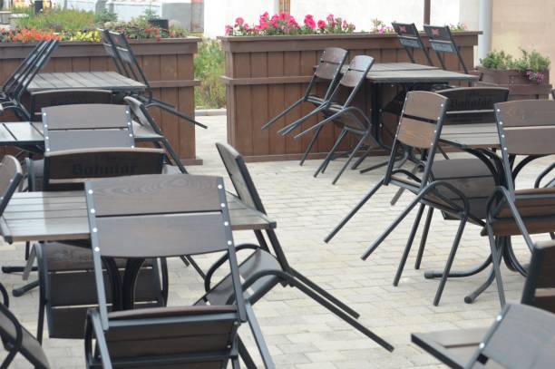 istock Tables and chairs in a cafe 1340901488