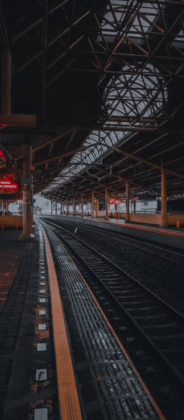 istock the railroad tracks at the train station 1340901948