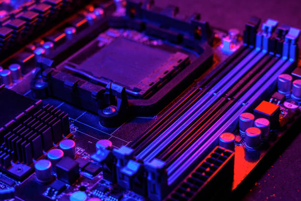istock Motherboard in neon red-blue color. 1340904048