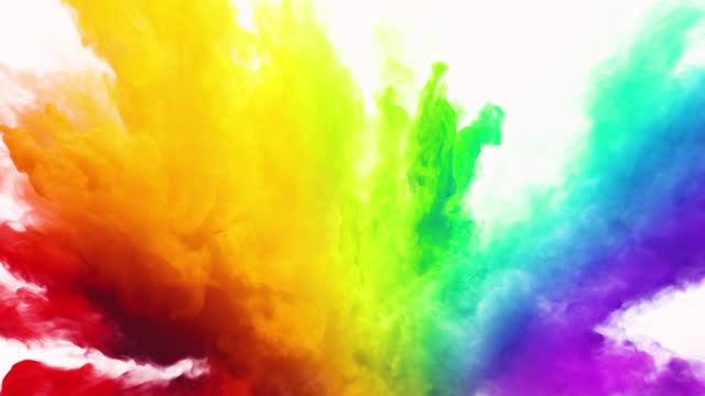 Cg animation of colorful smoke explosion on white background. Has alpha matte.