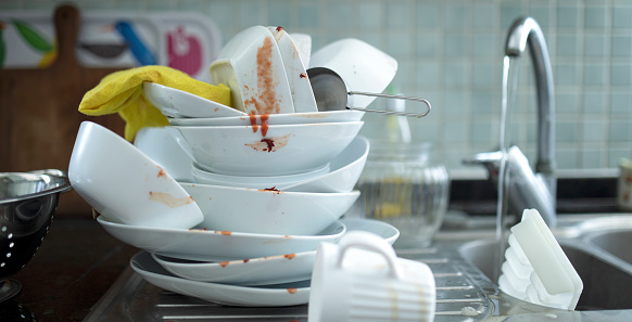 dirty dishes at the domestic kitchen