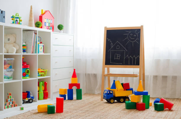 istock Children's playroom with plastic colorful educational blocks toys. 1340910962