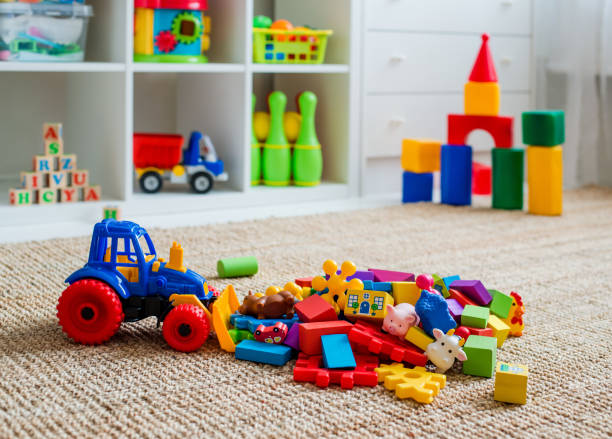 istock Children's playroom with plastic colorful educational blocks toys. 1340912012