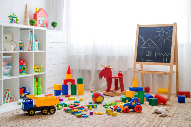 istock Children's playroom with plastic colorful educational blocks toys. 1340912149
