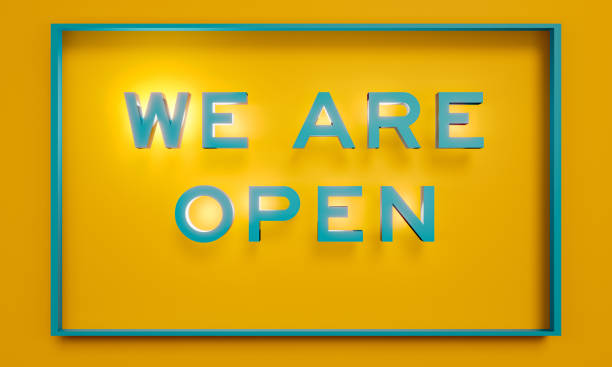 istock We are open - banner in yellow, with teal colored text. Letters in 3D. 1340913478