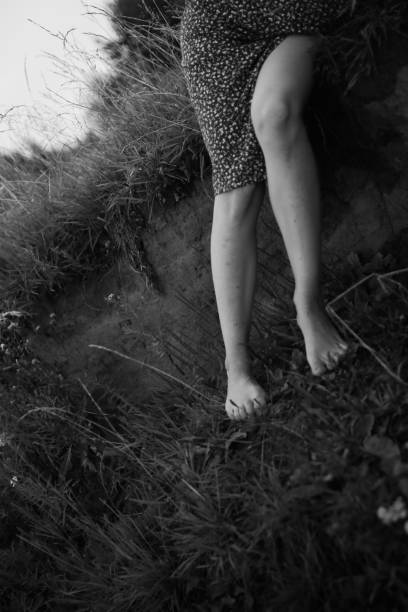 istock beautiful women's feet, walking barefoot 1340914635