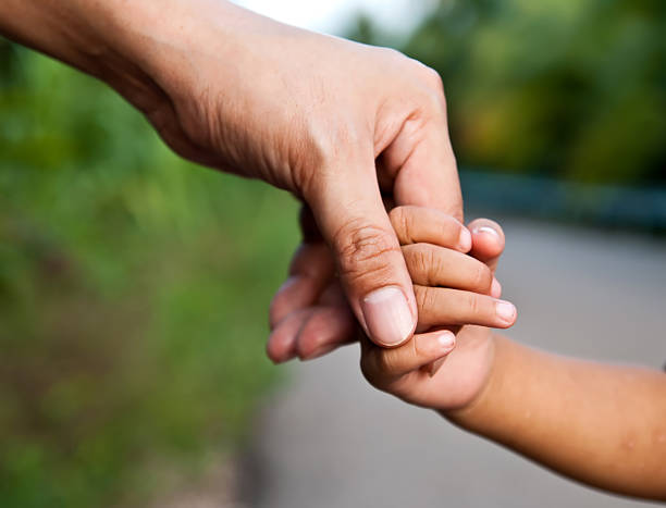 istock Father finger holding with baby hand 134091483