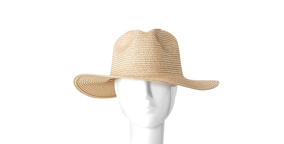 Straw hat seen from the front dressed in white mannequin, isolated