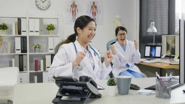 istock medical professional showing winning sign. 1340925905