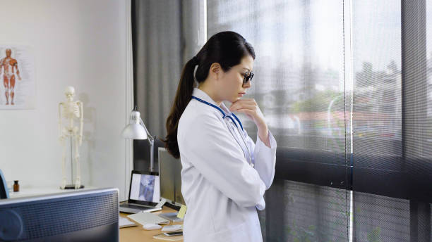 istock young woman doctor thinking concentrated 1340926355