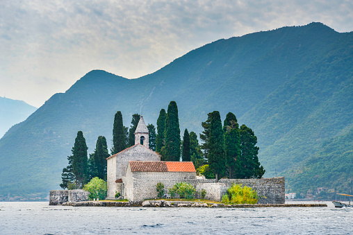 Situated along Boka Kotorska bay,close to the other islet of Our Lady of the Rock at this popular daytrip tourist destination not far from Kotor.