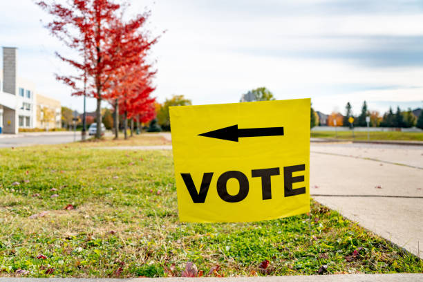 Election sign at Polling Station in Woodbridge, Ontario, Canada Election sign at Polling Station in Woodbridge, Ontario, Canada. tree stumping stock pictures, royalty-free photos & images