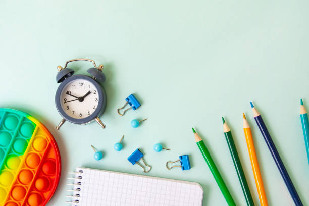 istock Background with different school supplies on the blue background.Back to school concept,top view. 1340932123