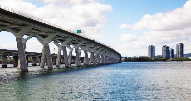 istock Montreal Champlain Bridge and Ile-des-soeurs skyline 1340933771