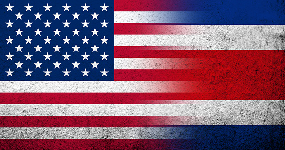 United States of America (USA) national flag with Costa Rica National flag. Grunge background
