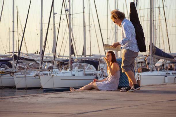 istock Two tourists lost in the harbor 1340943206