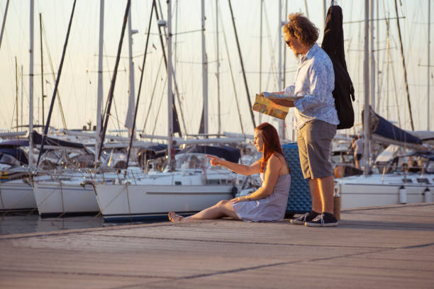 istock Two tourists lost in the harbor 1340943236