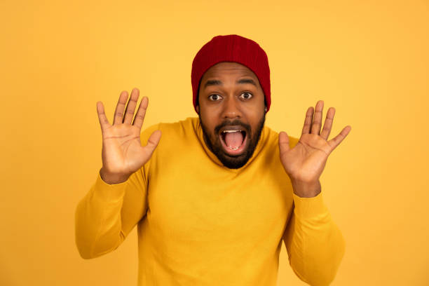 istock Afro man looking with a shocked expression to the camera. 1340945658