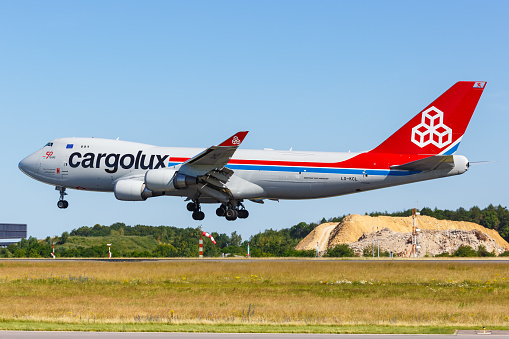 Findel, Luxembourg - June 24, 2020: Cargolux Boeing 747-400F airplane at Findel Airport (LUX) in Luxembourg. Boeing is an American aircraft manufacturer headquartered in Chicago.