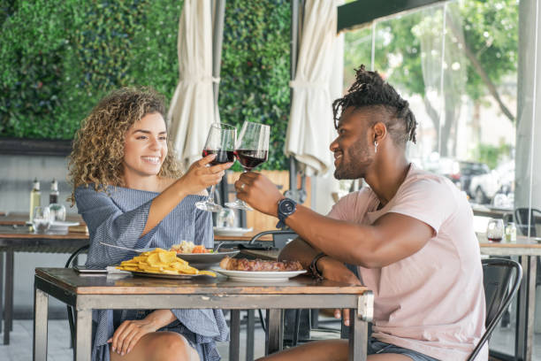 istock Couple having a lunch date at a restaurant. 1340946151
