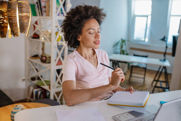 istock Woman attends online course at home 1340947667