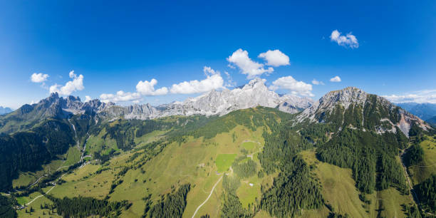 istock Mount Dachstein massif  -  mountain aerial panoramic view 1340949980