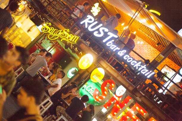 Central London, Street, West End, City Of Westminster, England, United Kingdom — July 12th 2024. Raymond Revuebar. a famous strip club and theatre, in London's Soho district. a huge, brightly lit sign on its facade that proclaimed it to be the \