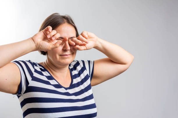 istock A woman with a sad face and a sore eye for conjunctivitis. 1340951431