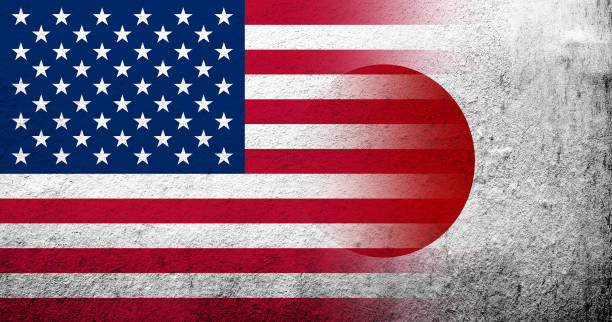 flaga narodowa stanów zjednoczonych ameryki (usa) z flagą narodową japonii. tło grunge'owe - japanese flag flag japan japanese culture stock illustrations