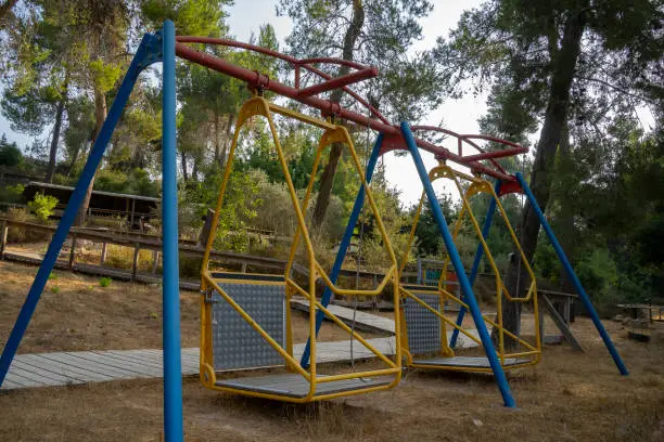 Swing suitable for wheelchairs, in a park for disabled people near Jerusalem, Israel.