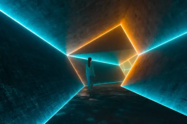 Businesswoman walking in futuristic illuminated dark corridor, 3D generated image.