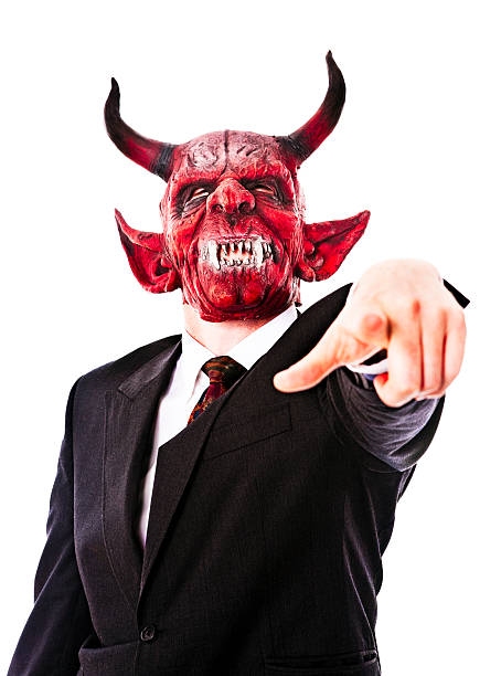 Business demon He wants you. If you haven't sold your soul already, now is the time. Camera: Canon EOS 1Ds Mark III. devil costume stock pictures, royalty-free photos & images