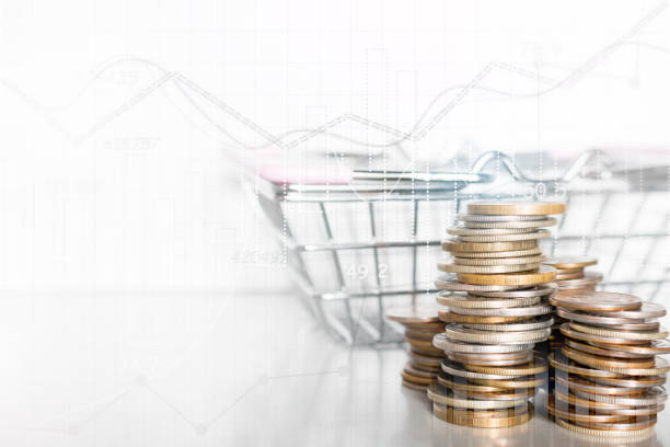 istock stack of coins and grocery cart on a white background with place for text concept for inflation, poverty, shopping 1340967669