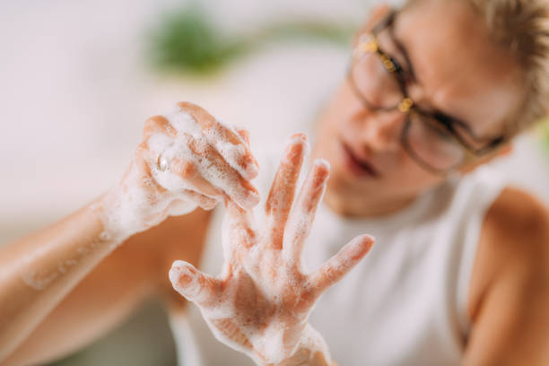 obsessive compulsive disorder concept. woman obsessively washing her hands. - obsessive imagens e fotografias de stock