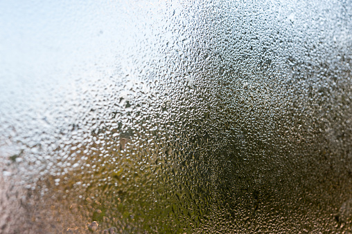Condensed dew on a glass. Abstract background for your presentations and Internet pages.