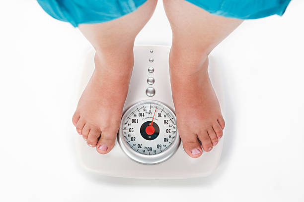 100+ Weight Scale Human Foot Sock Standing Stock Photos, Pictures &  Royalty-Free Images - iStock