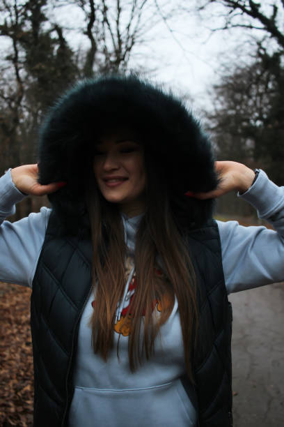 istock Posing of young woman in forest 1340971520