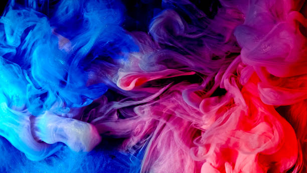istock Fluid art abstract background color ink in water mix 1340971562