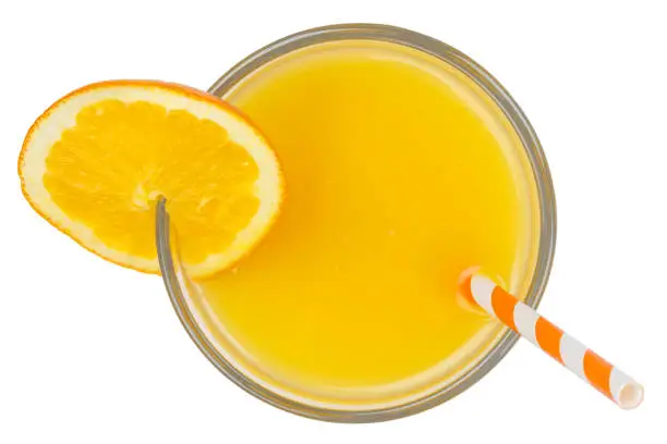 Orange juice fresh drink in a glass isolated on a white background from above
