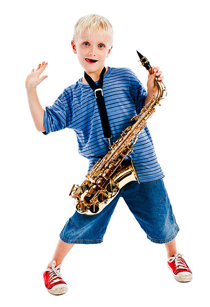 istock Pretty cool playing, huh? Boy and his sax take five 134097297