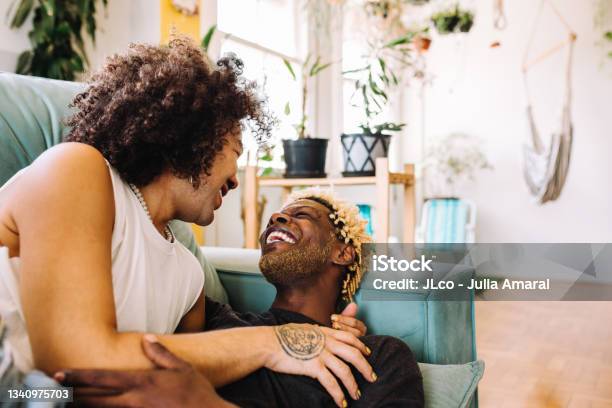 Cheerful Young Gay Couple Being Romantic At Home Stock Photo - Download Image Now - African-American Ethnicity, Black People, Gay Person