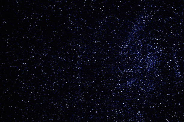 istock Blue stars in space, sky, defocused blue lights, shiny particles, abstract background 1340975754