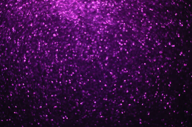 istock Defocused purple bokeh lights background,  Christmas Lights, 1340975774